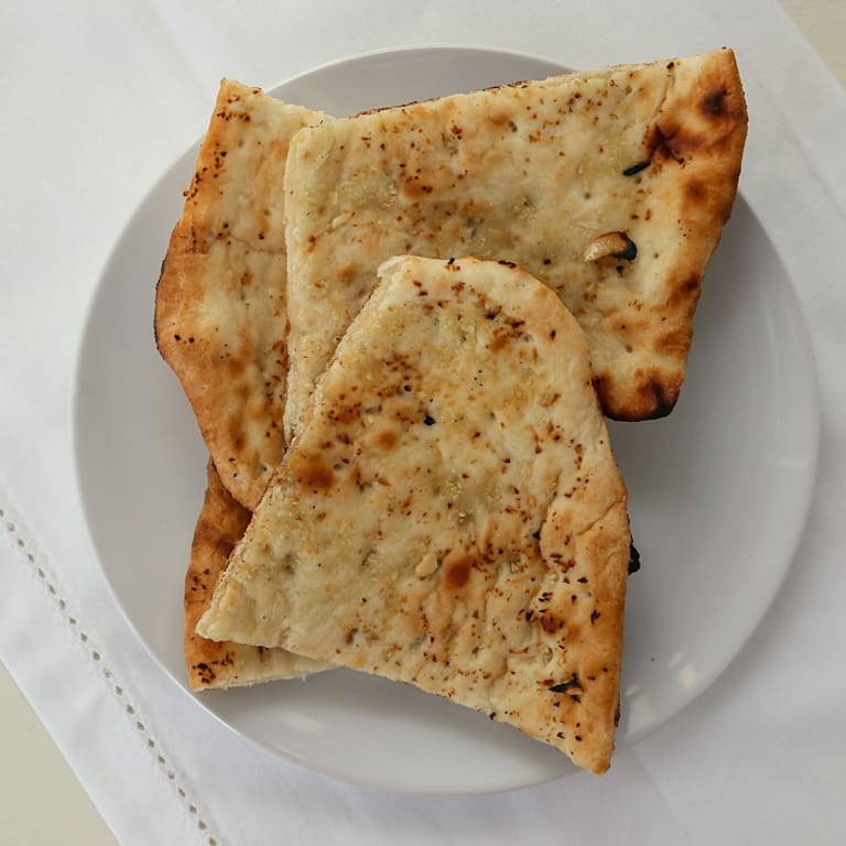 Savor our authentic naan